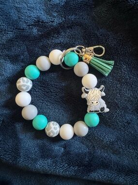 Kids Teal and Gray Beaded Tassel Keyring with Highland Cow Charm. Handmade by me